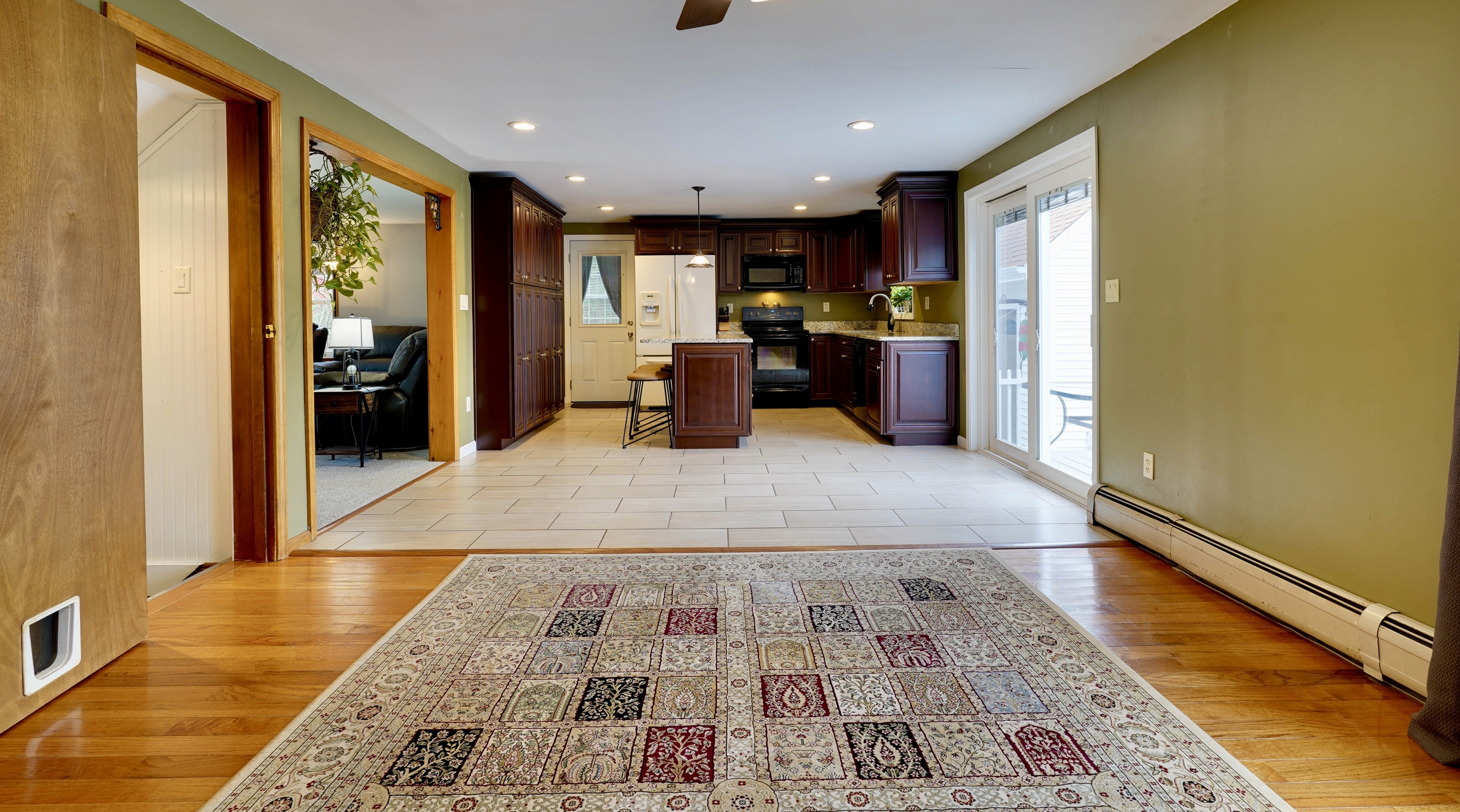 85 Bailey Woods Road Brooklyn, CT 06234 - Photo 27 of 35 a kitchen with stainless steel appliances granite countertop a refrigerator and a sink