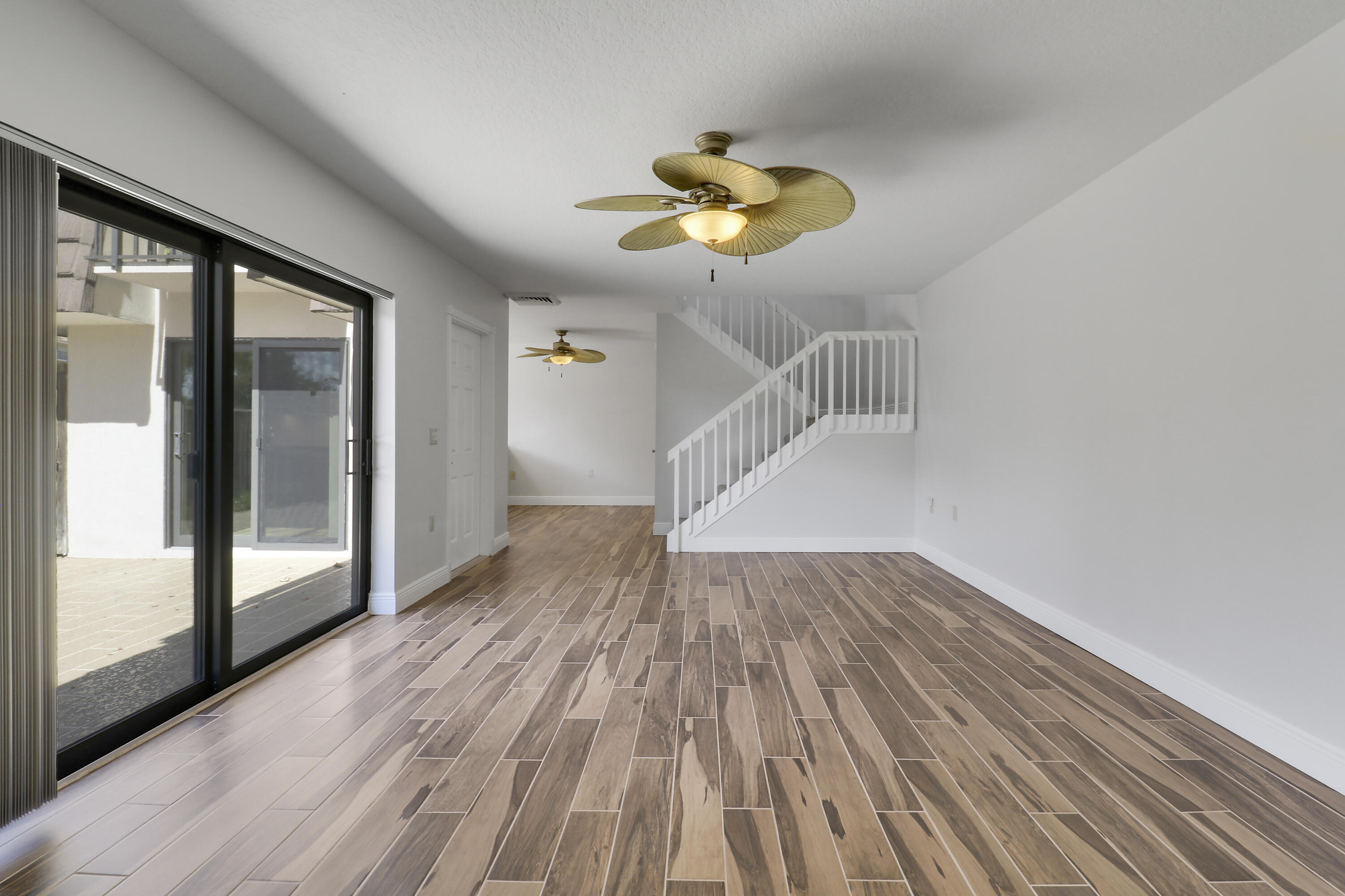 2324 23rd Court, Unit 55D Jupiter, FL 33477 - Photo 12 of 41 a view of entryway with wooden floor