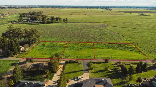 a view of an ocean and a houses