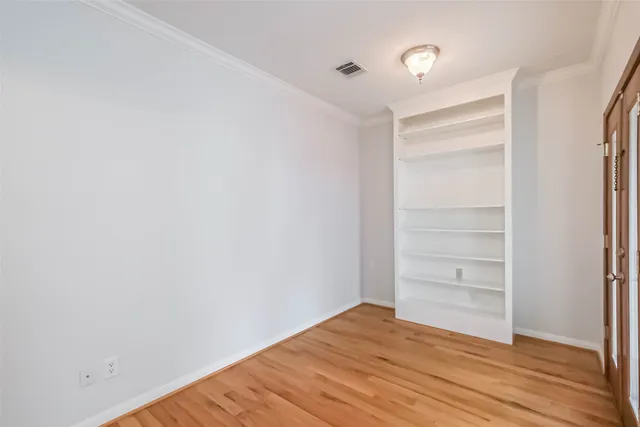 a bathroom with a granite countertop sink a mirror and a window