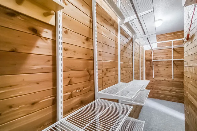 a view of a livingroom with a ceiling fan and a window