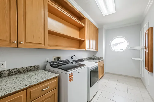 a view of a house with backyard porch and sitting area
