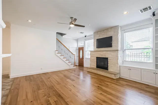 a view of kitchen with wooden floor and window