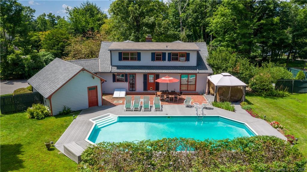 5 North Beech Tree Road Brookfield, CT 06804 - Photo 1 of 1 a view of a house with backyard sitting area and garden
