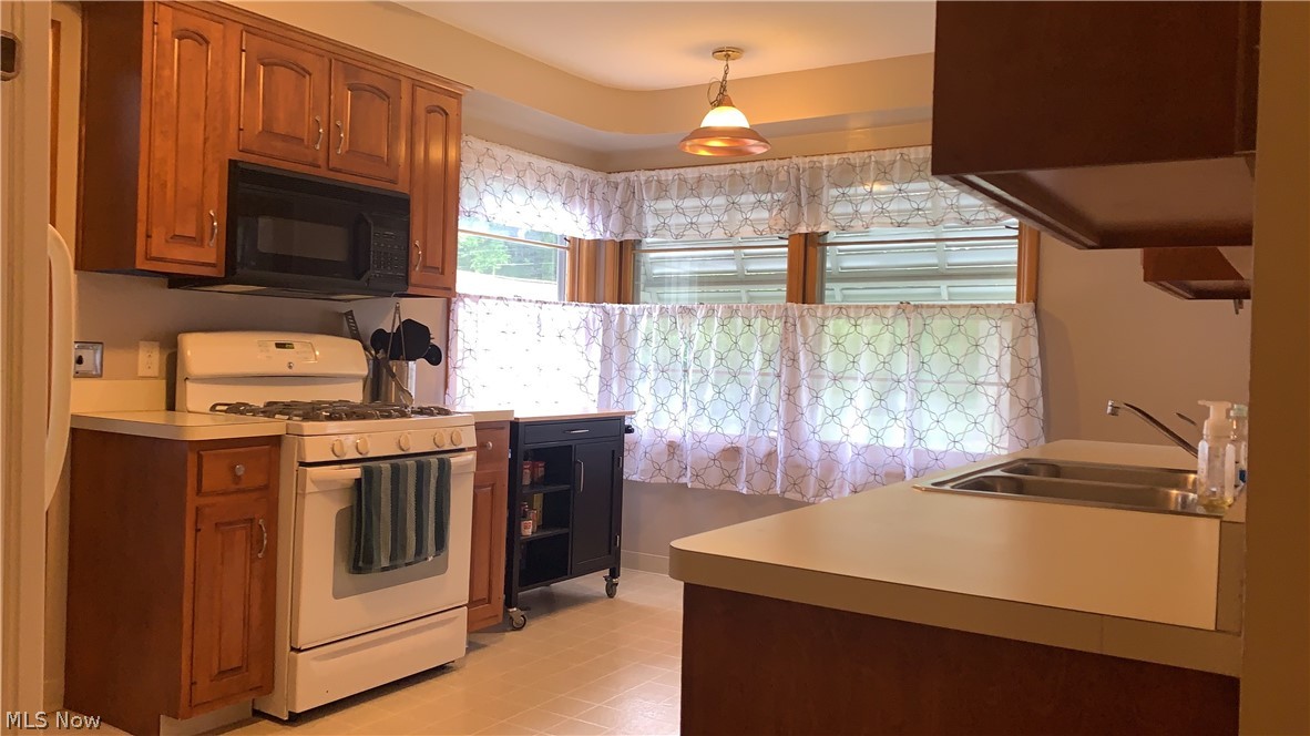 975 Lander Road Cleveland, OH 44143 - Photo 5 of 22 Spacious Kitchen with updated cabinets