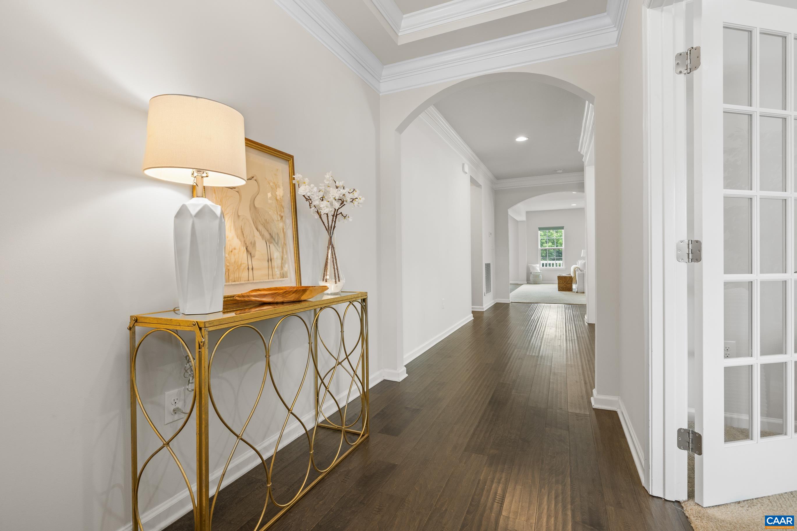 1622 Fowler Ridge Court Charlottesville, VA 22901 - Photo 12 of 75 a view of a hallway with wooden floor and staircase