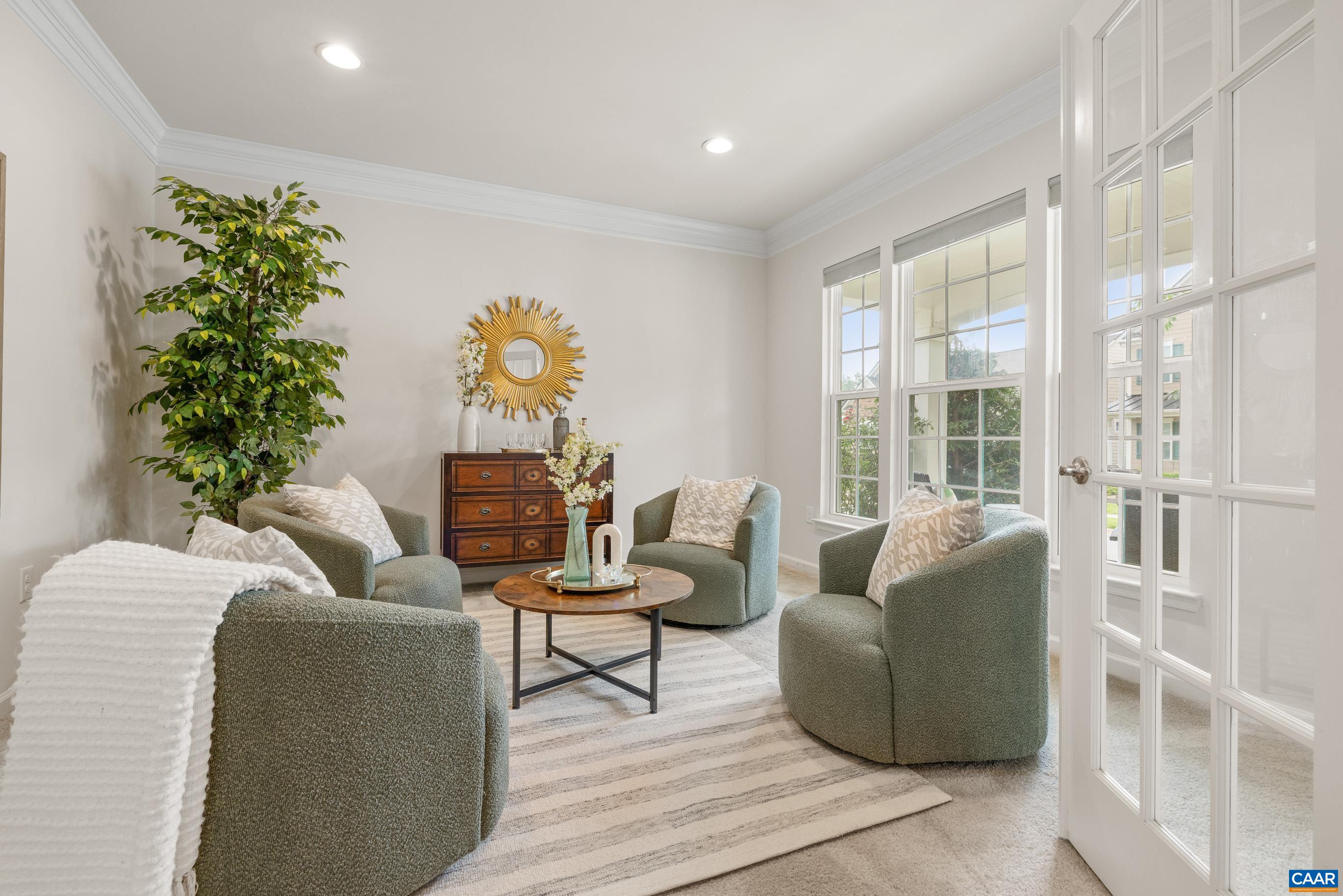 1622 Fowler Ridge Court Charlottesville, VA 22901 - Photo 13 of 75 a living room with furniture and a potted plant
