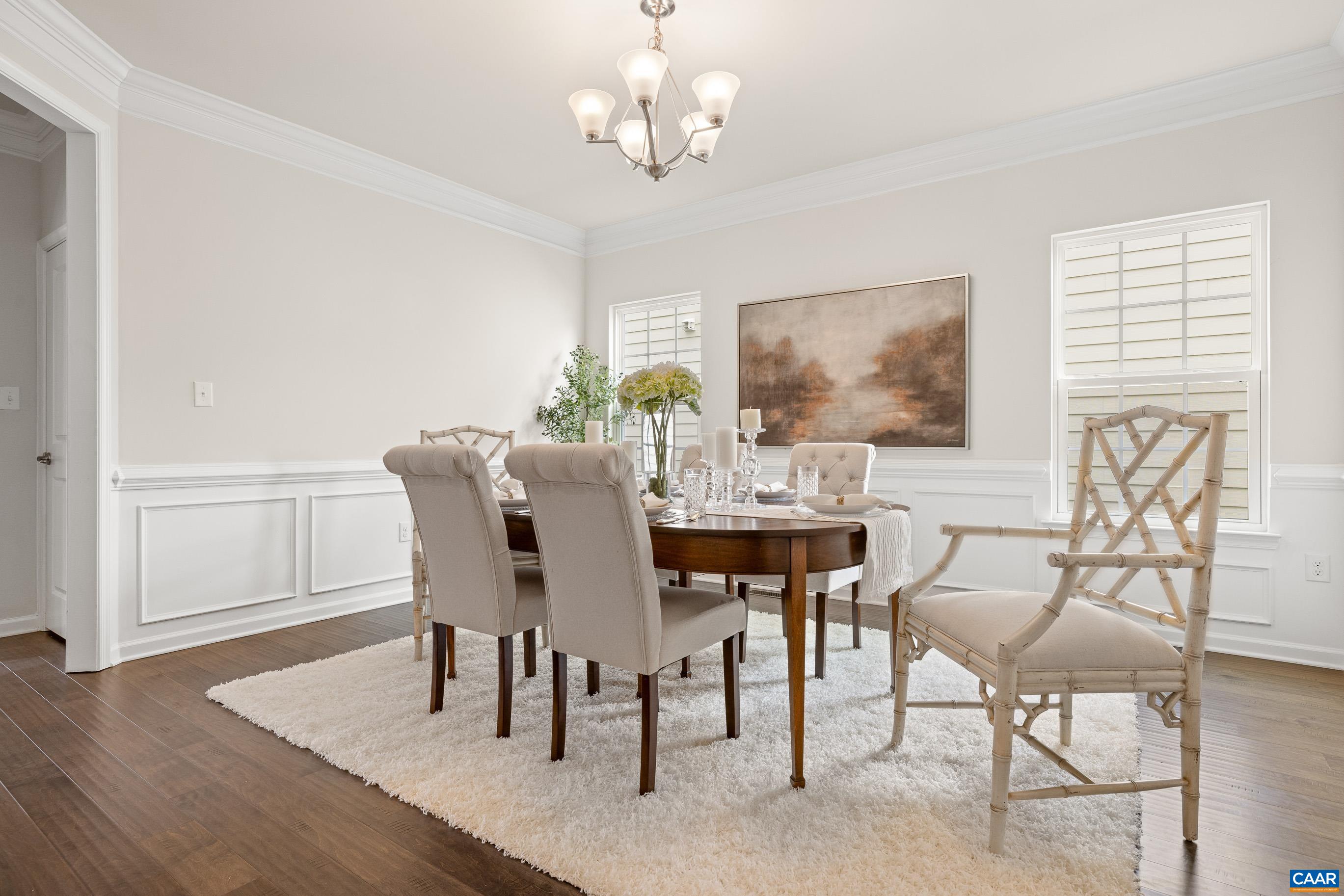 1622 Fowler Ridge Court Charlottesville, VA 22901 - Photo 17 of 75 a view of a dining room with furniture window and wooden floor
