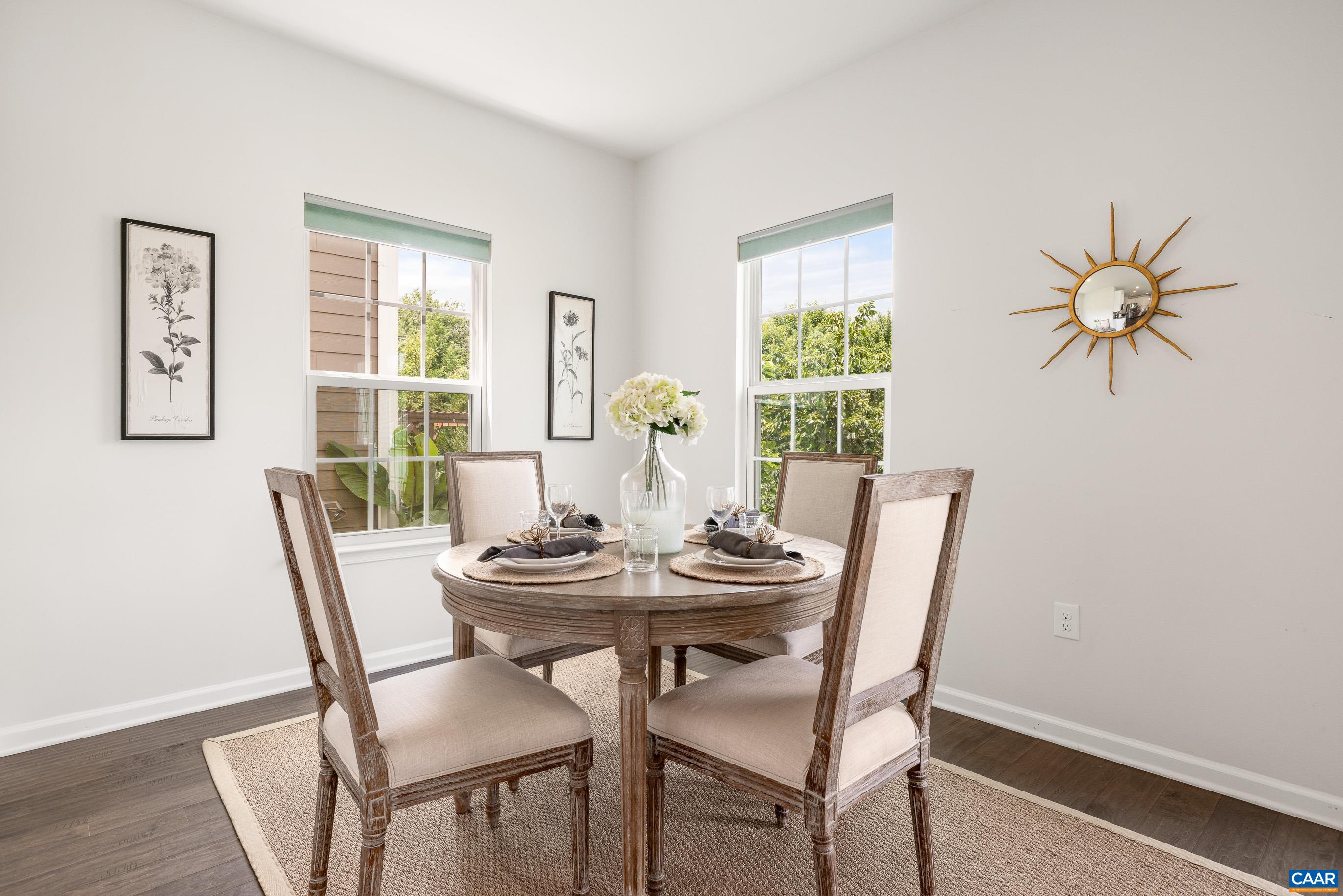 1622 Fowler Ridge Court Charlottesville, VA 22901 - Photo 28 of 75 a view of a dining room with furniture window and wooden floor