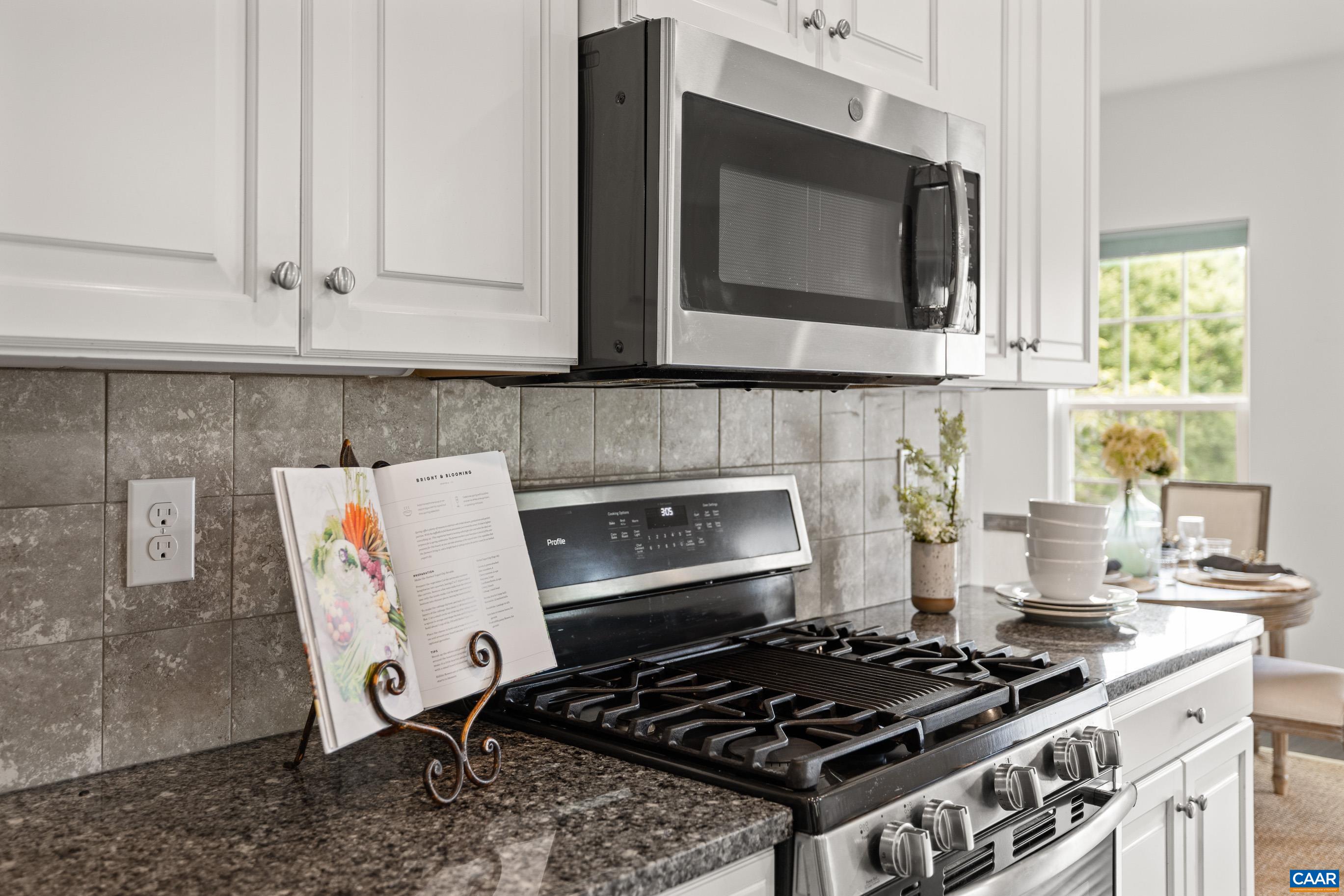 1622 Fowler Ridge Court Charlottesville, VA 22901 - Photo 38 of 75 a stove top oven sitting inside of a kitchen