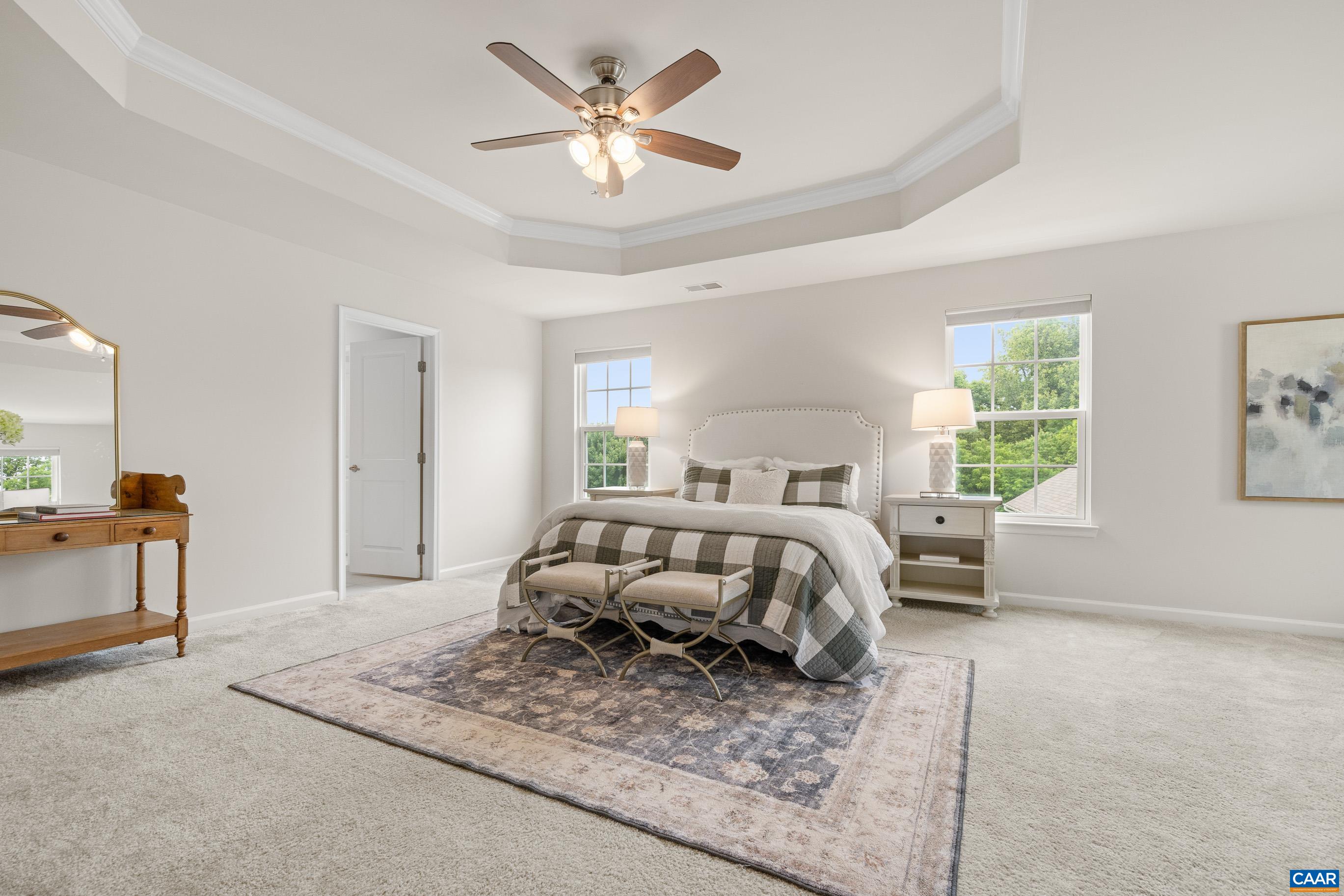 1622 Fowler Ridge Court Charlottesville, VA 22901 - Photo 44 of 75 a bedroom with a bed painting on wall and a large window