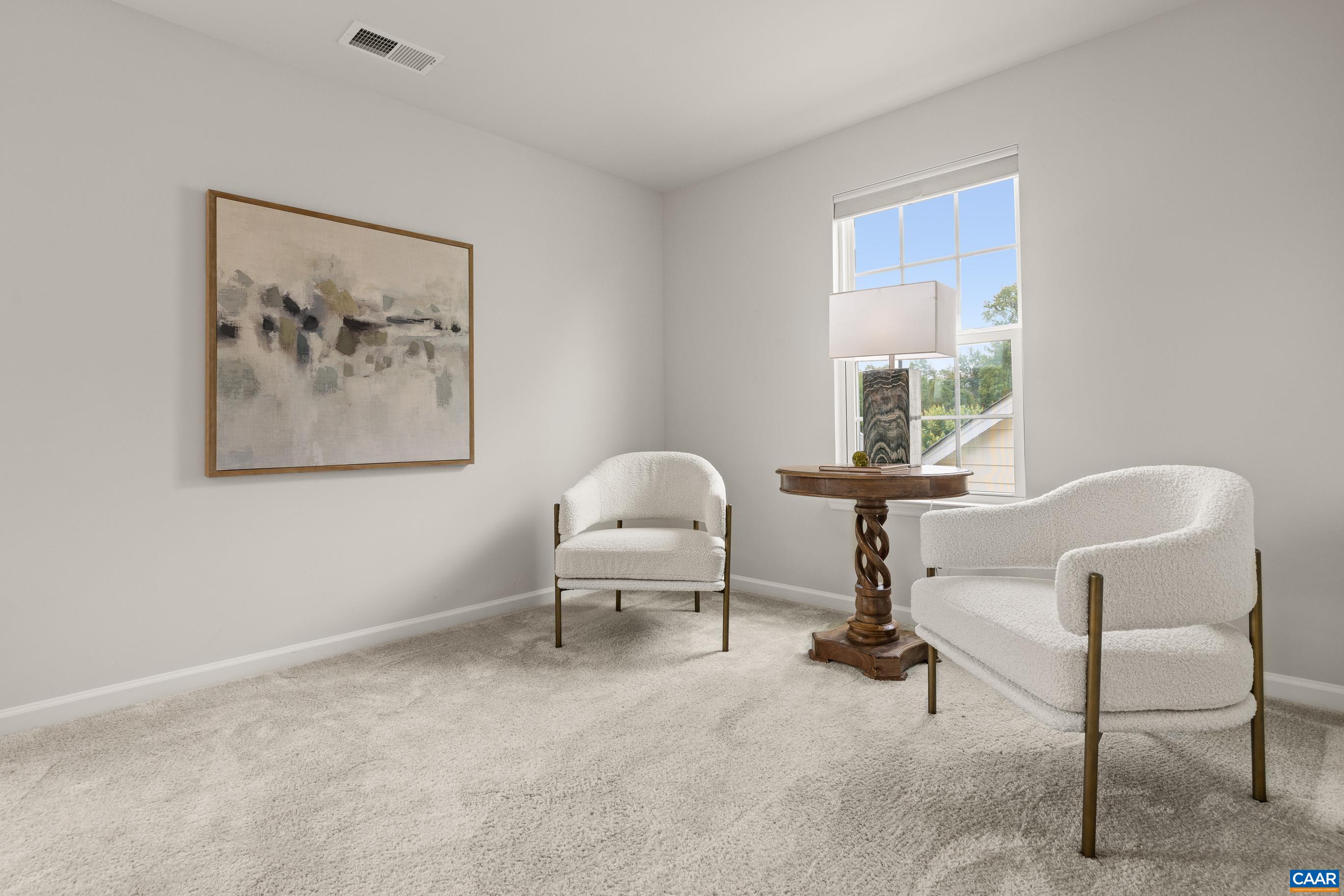 1622 Fowler Ridge Court Charlottesville, VA 22901 - Photo 47 of 75 a living room with furniture and a window