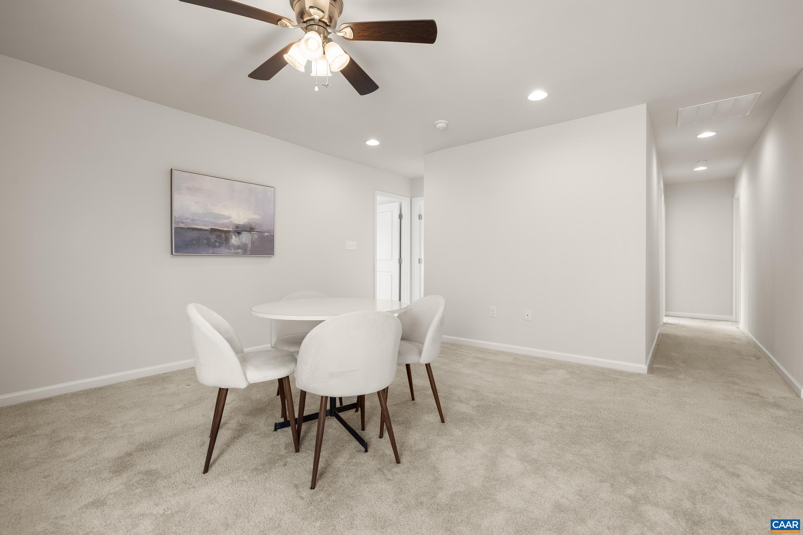 1622 Fowler Ridge Court Charlottesville, VA 22901 - Photo 55 of 75 a view of a dining room with furniture