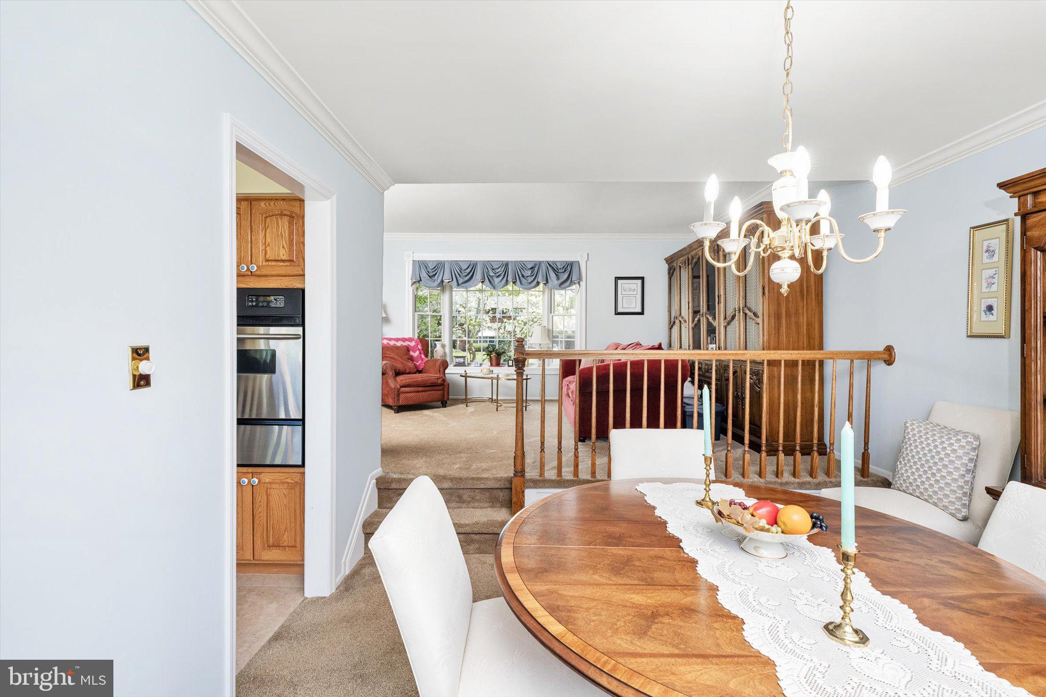 1111 Estates Boulevard Hamilton, NJ 08690 - Photo 11 of 47 a living room with furniture mirror and wooden floor