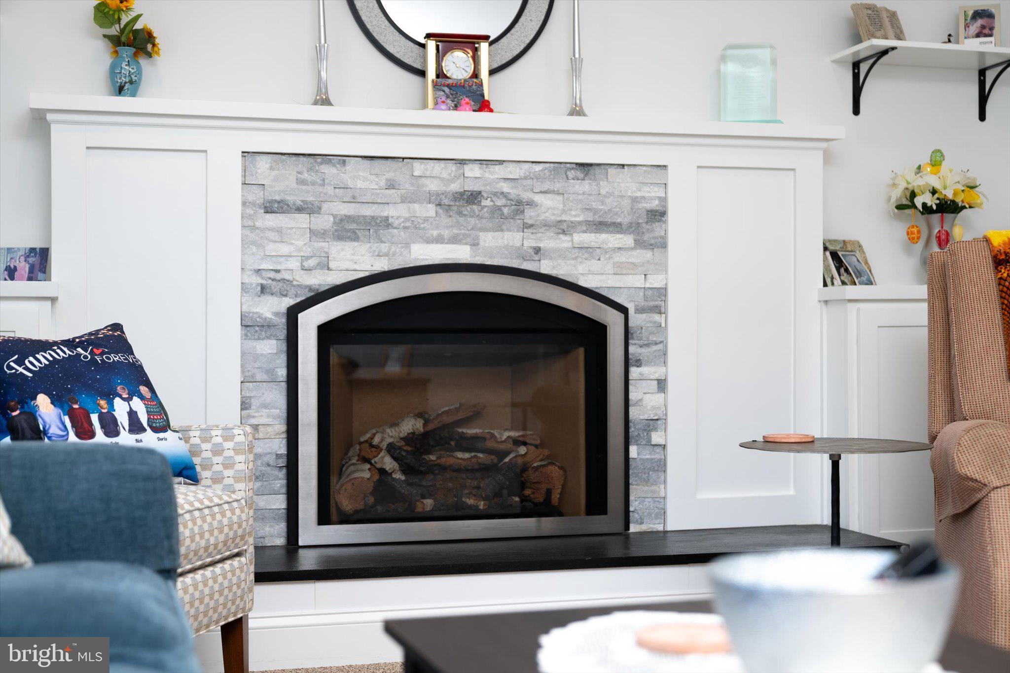 1111 Estates Boulevard Hamilton, NJ 08690 - Photo 18 of 47 a living room with furniture and a fireplace