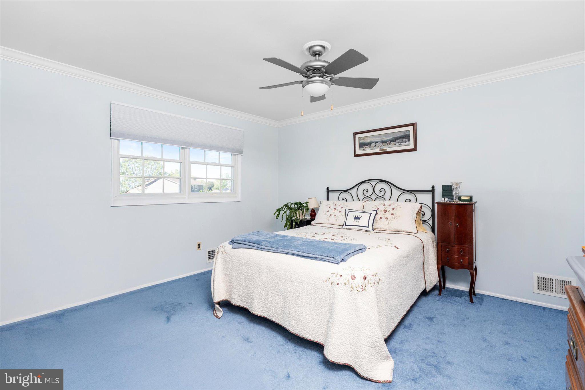 1111 Estates Boulevard Hamilton, NJ 08690 - Photo 26 of 47 a bedroom with a bed and window