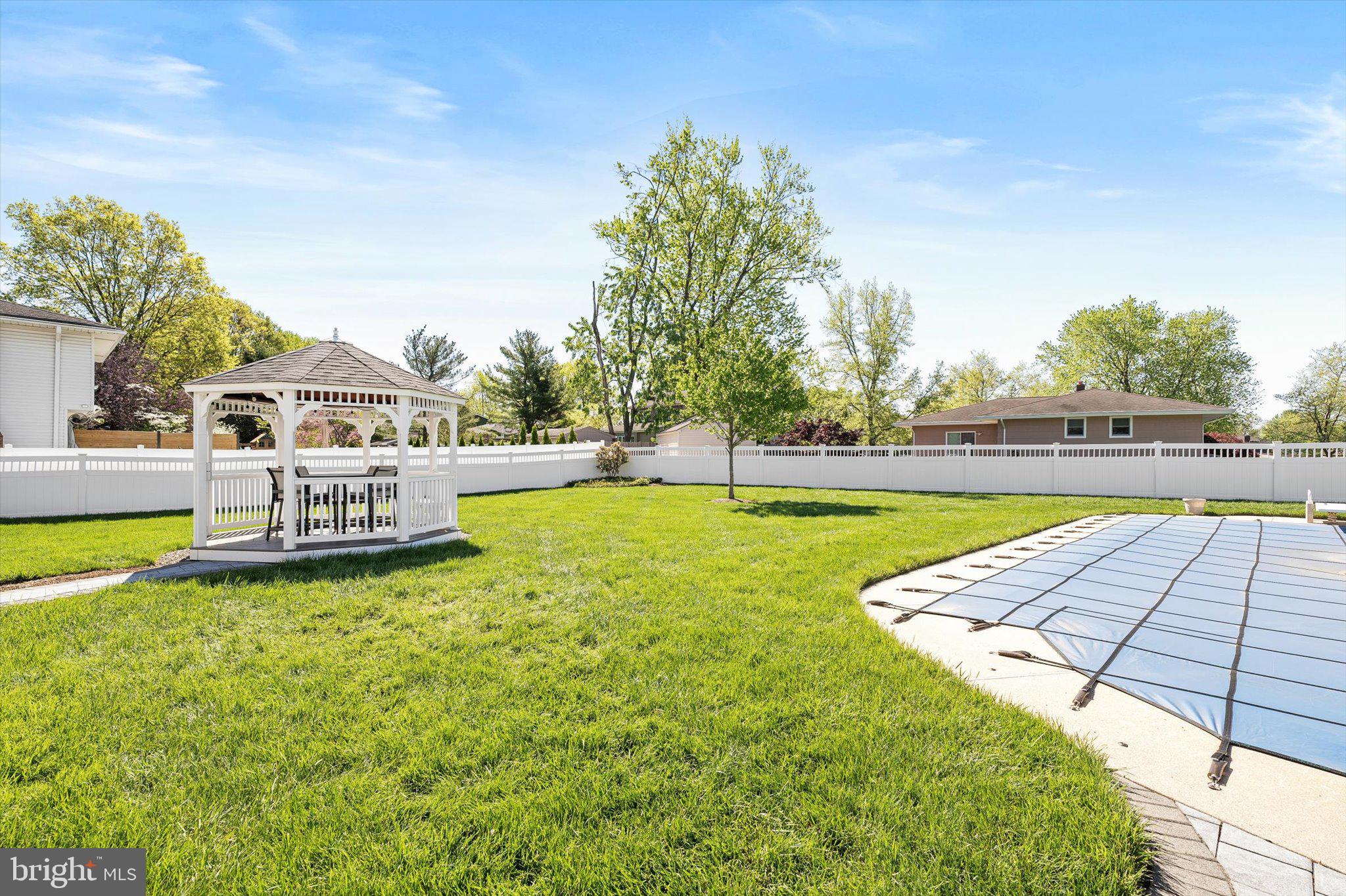 1111 Estates Boulevard Hamilton, NJ 08690 - Photo 44 of 47 a view of a swimming pool with a patio