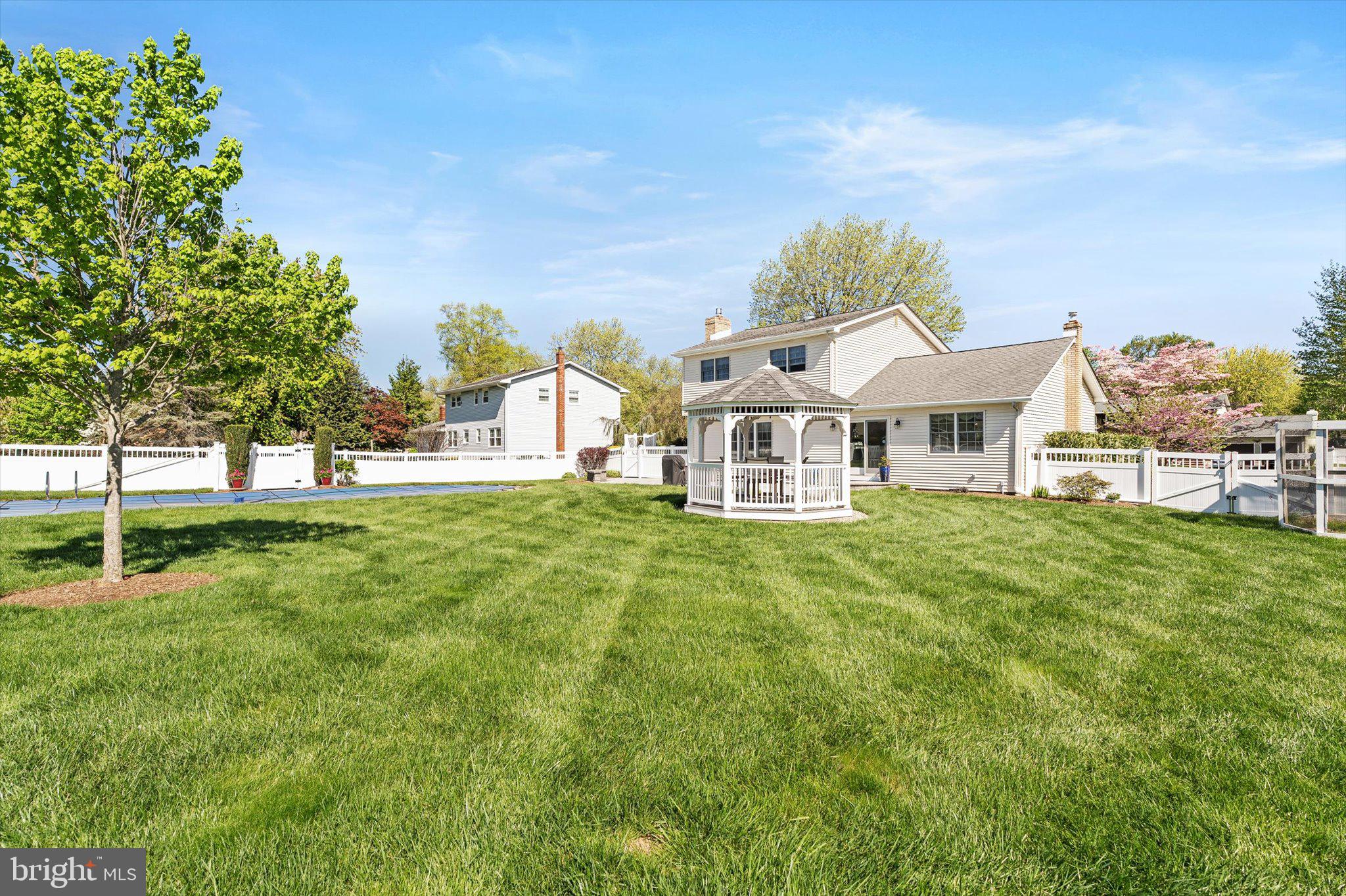 1111 Estates Boulevard Hamilton, NJ 08690 - Photo 46 of 47 a view of house with garden space and trees