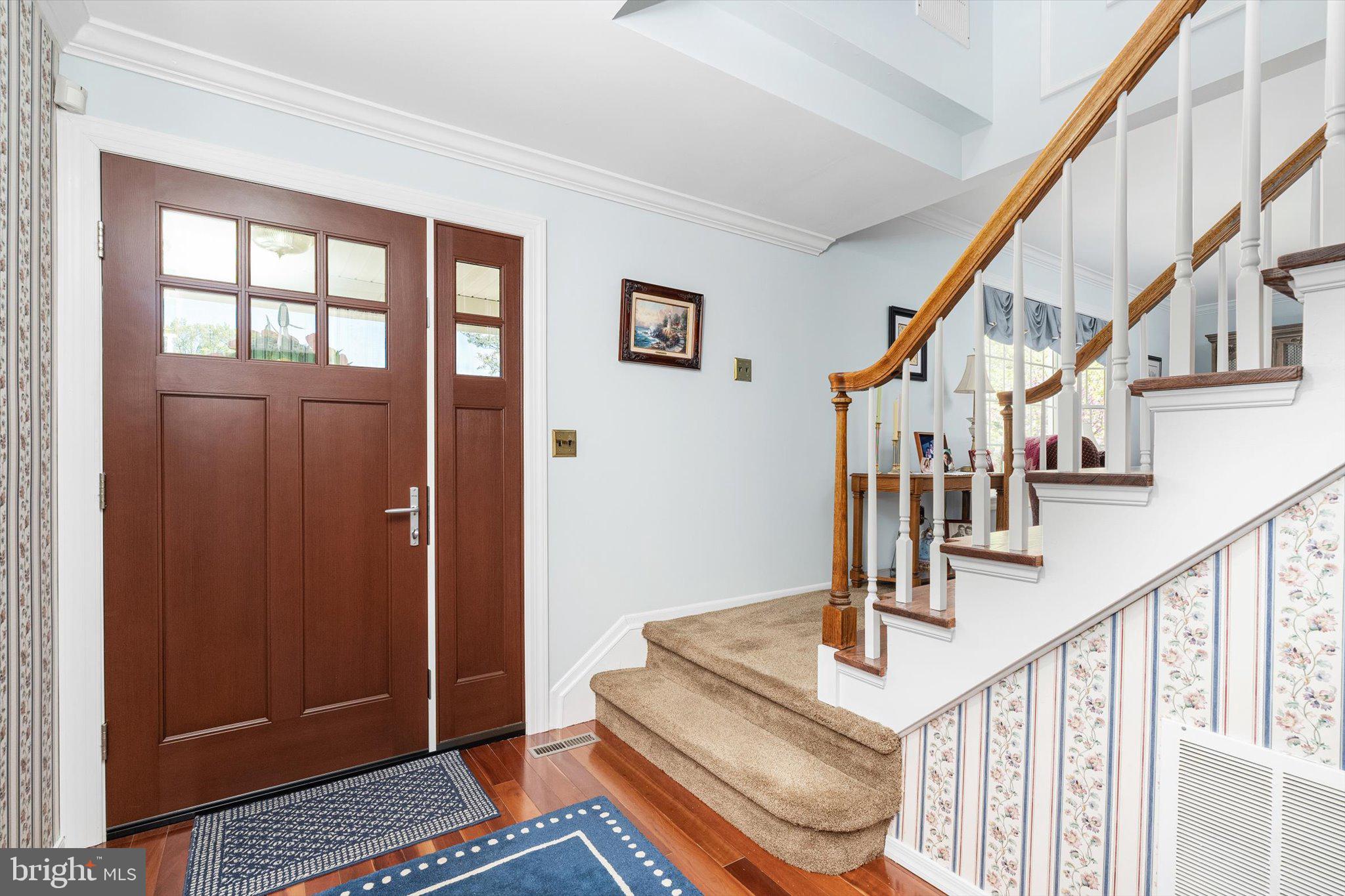 1111 Estates Boulevard Hamilton, NJ 08690 - Photo 6 of 47 a view of entryway and hall with wooden floor
