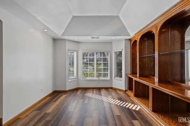 a kitchen with stainless steel appliances granite countertop a sink and a counter space