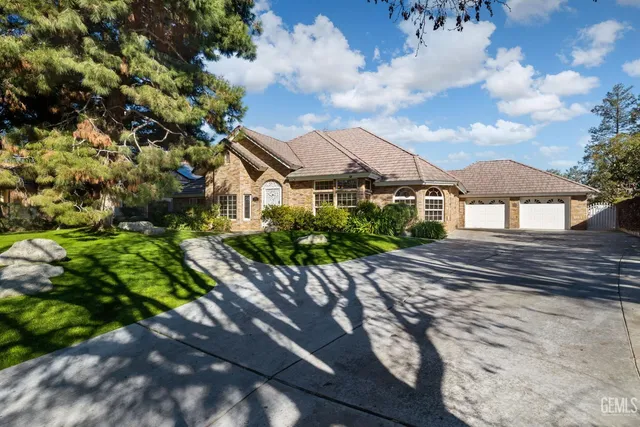 a view of a room with wooden floor windows and entryway