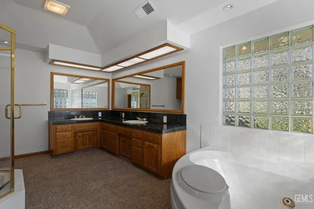 a view of a swimming pool with a yard