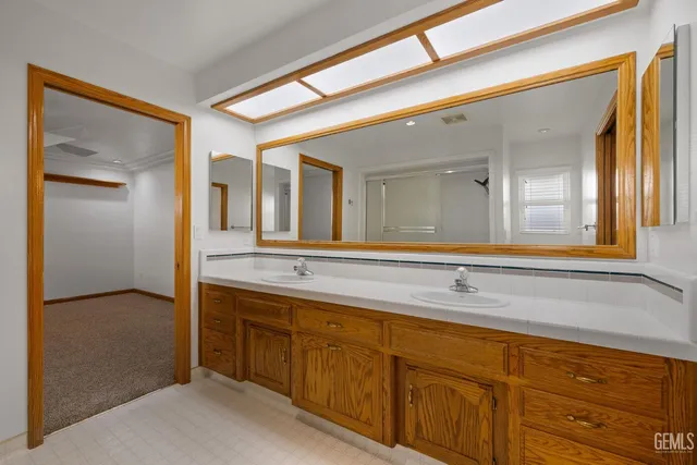 an aerial view of a house with a swimming pool yard and outdoor seating