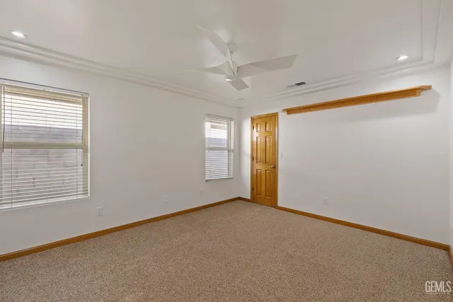 an aerial view of a house with a swimming pool