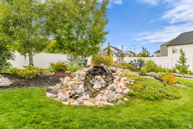 2454 West Jackson Street Mapleton, UT 84664 - Photo 51 of 63 Fenced backyard with a water feature