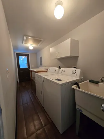 a utility room with dryer and washer