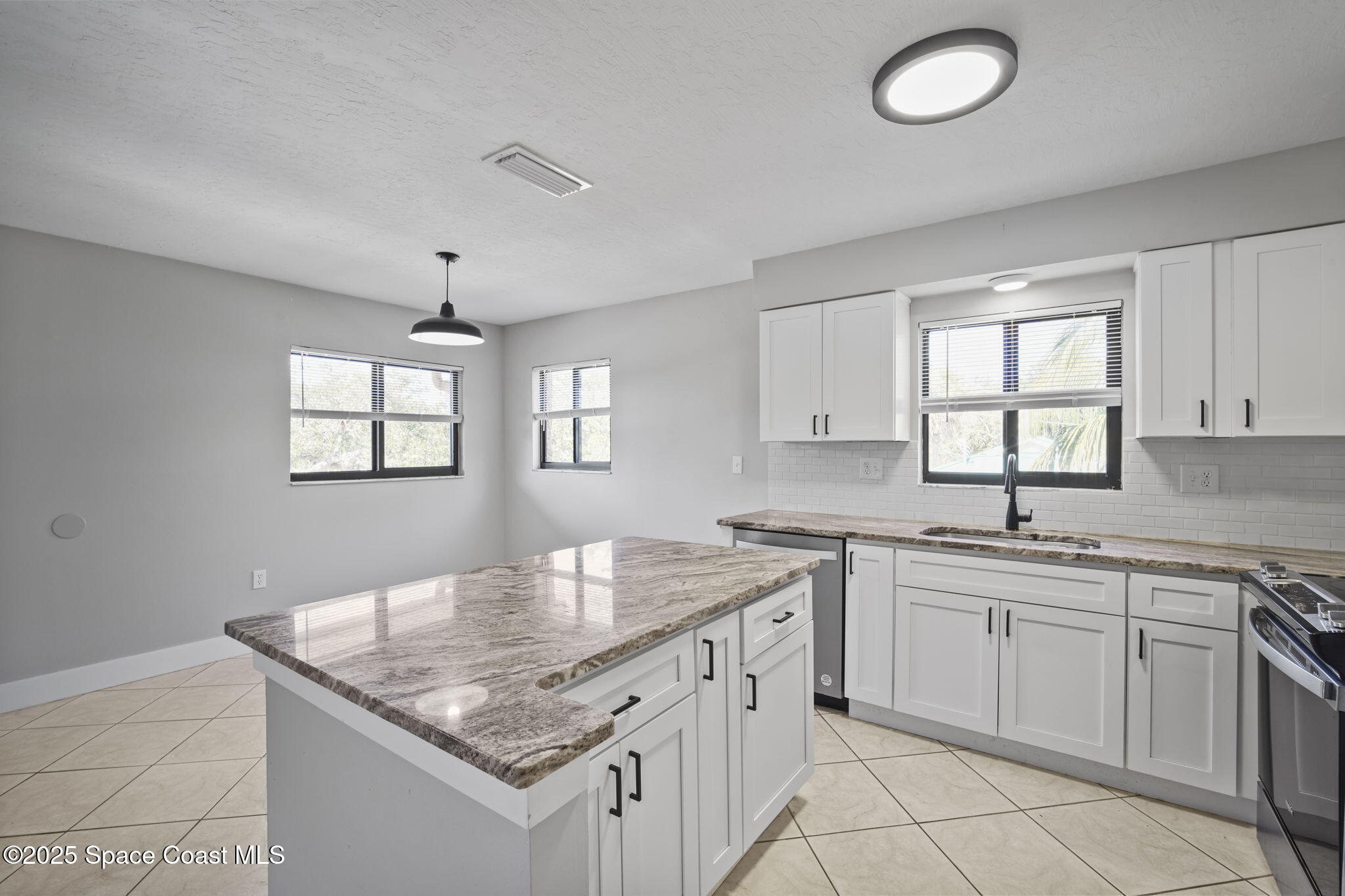 201 Cocoa Isles Boulevard, Unit 3 Cocoa Beach, FL 32931 - Photo 9 of 21 14-web-or-mls-COCOAISLES51