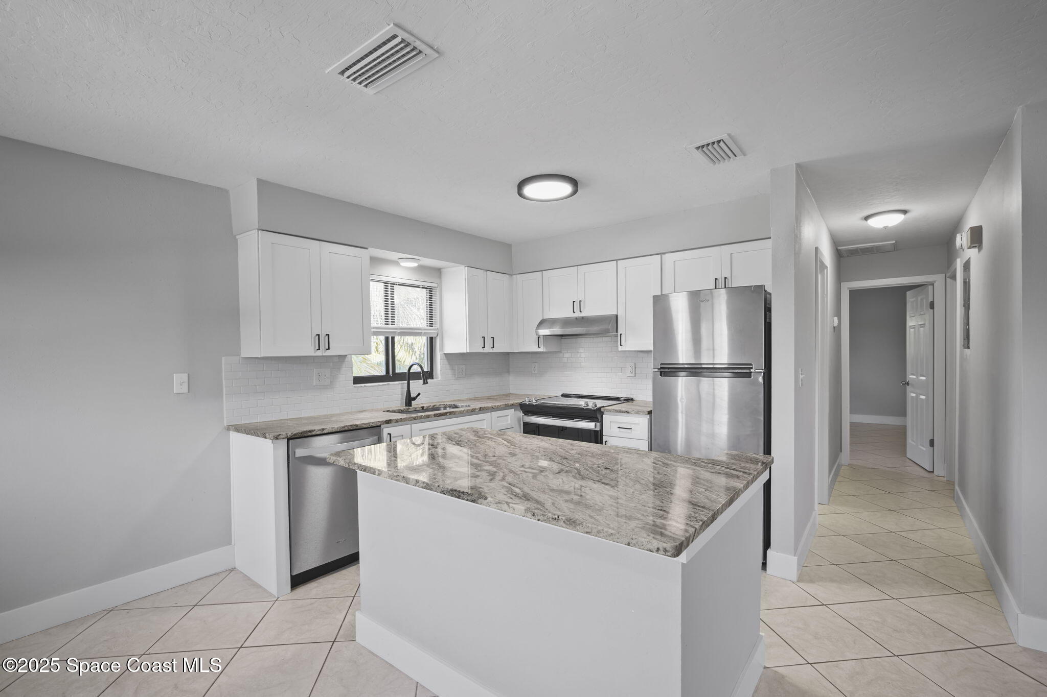 201 Cocoa Isles Boulevard, Unit 3 Cocoa Beach, FL 32931 - Photo 6 of 21 Updated Kitchen