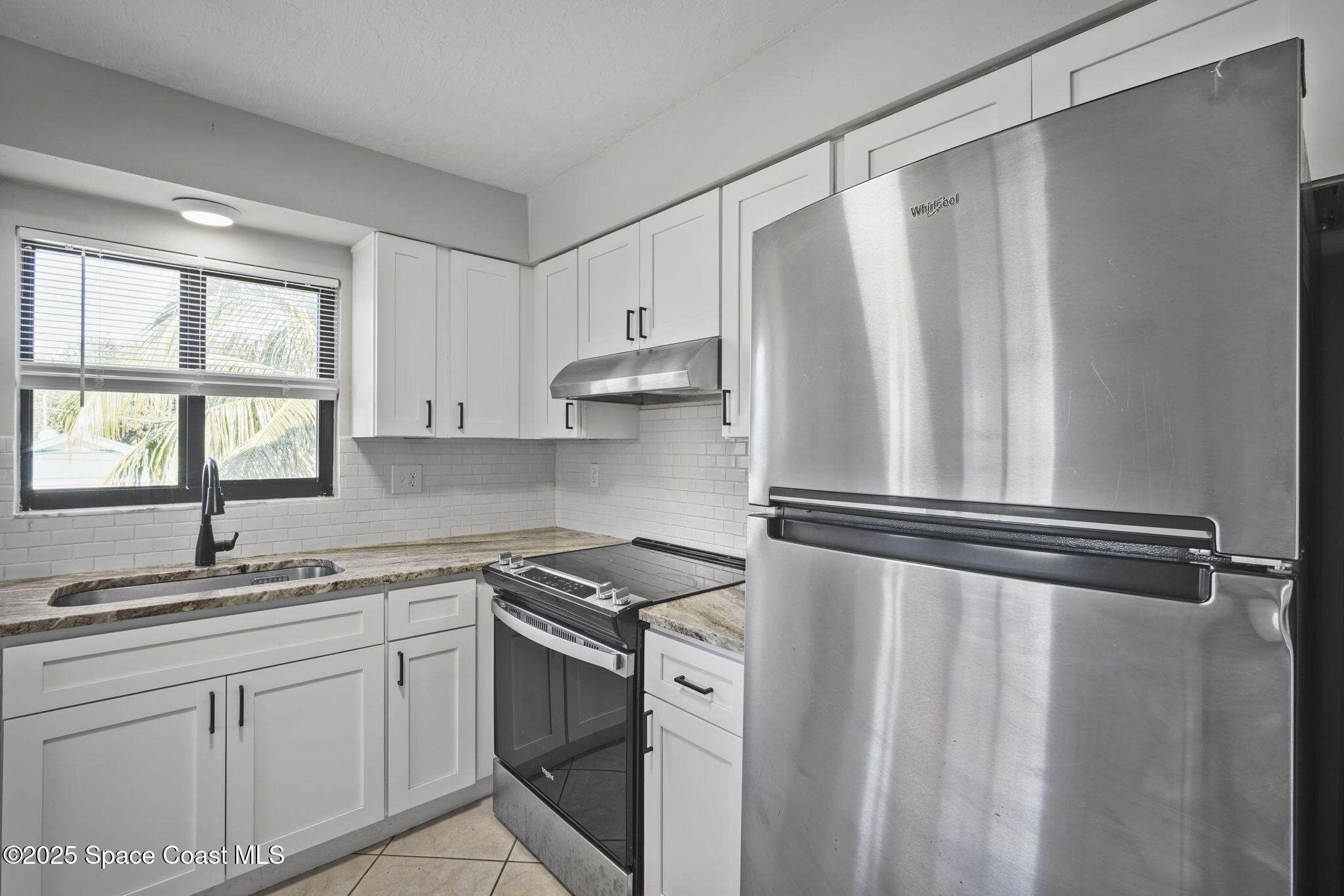 201 Cocoa Isles Boulevard, Unit 3 Cocoa Beach, FL 32931 - Photo 8 of 21 Updated Kitchen