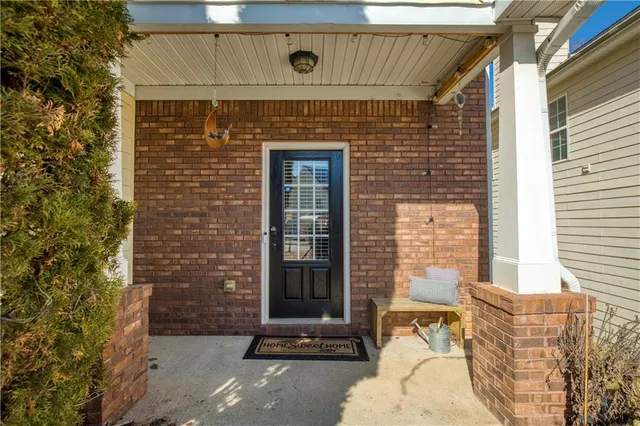 a front view of a house with a garage