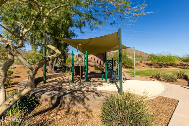 a view of swimming pool with a patio