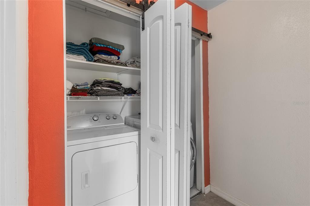 2004 Ludlow Lane, Unit 2803 Orlando, FL 32839 - Photo 21 of 31 a utility room with dryer and washer