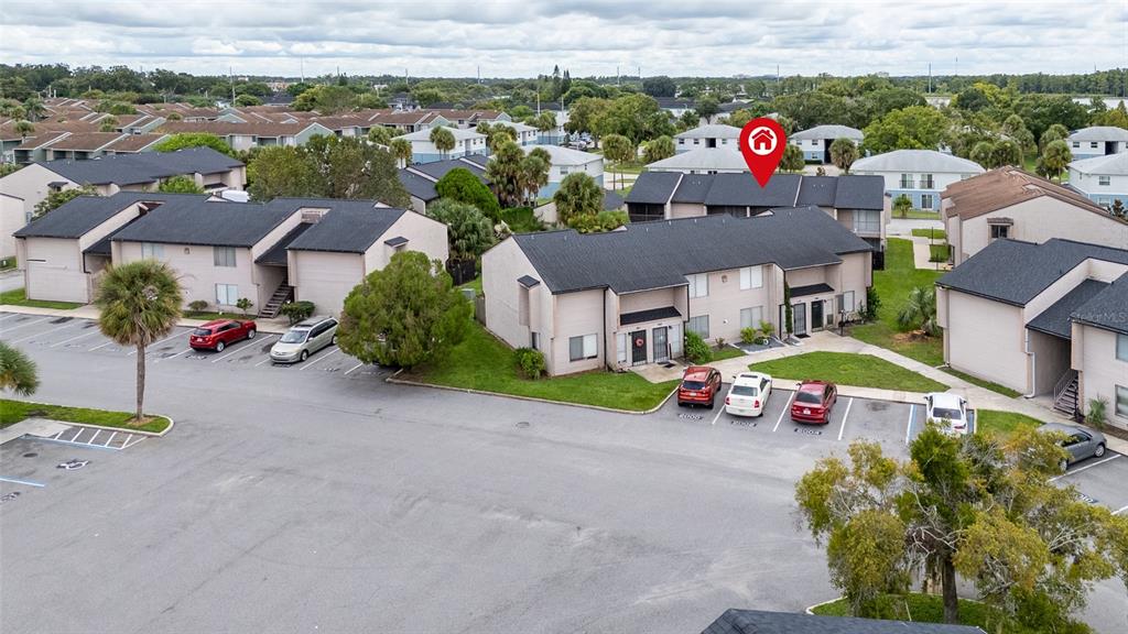 2004 Ludlow Lane, Unit 2803 Orlando, FL 32839 - Photo 25 of 31 an aerial view of a house with a garden and mountain view in back