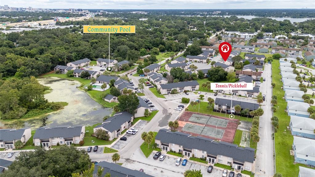 2004 Ludlow Lane, Unit 2803 Orlando, FL 32839 - Photo 29 of 31 an aerial view of residential houses with outdoor space