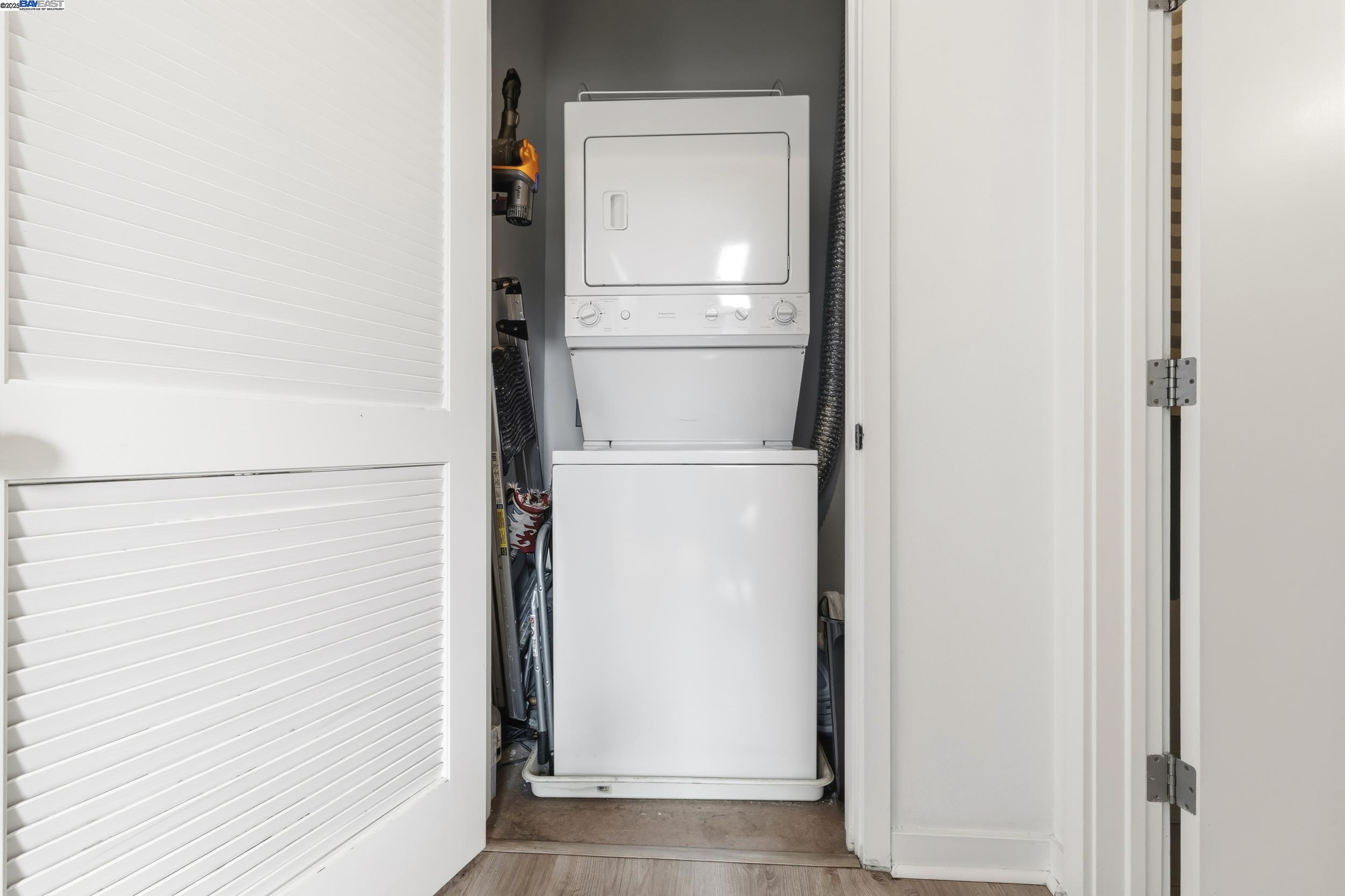 630 Thomas L Berkley Way, Unit 403 Oakland, CA 94612 - Photo 24 of 29 a view of closet with wooden floor