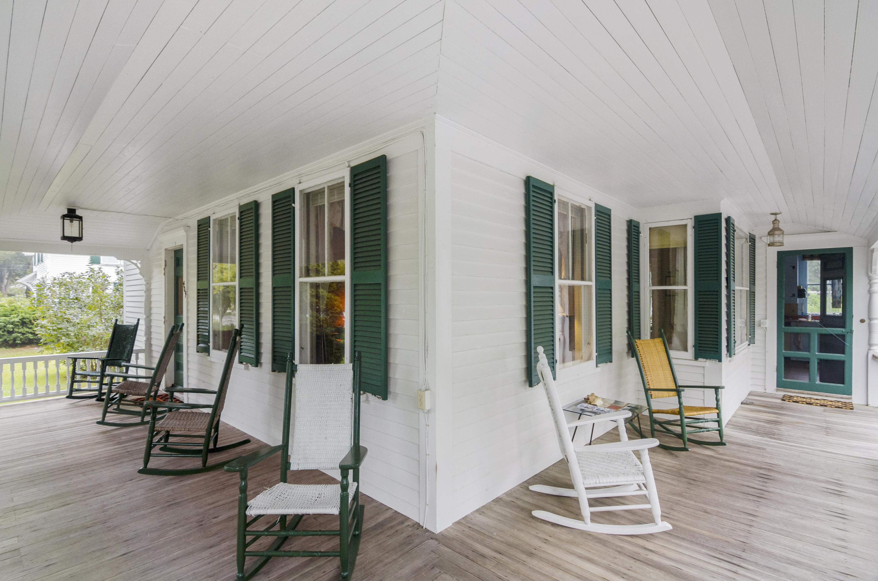 409 Barlows Landing Road Pocasset, MA 02559 - Photo 3 of 26 a view of a house with wooden floor and outdoor seating