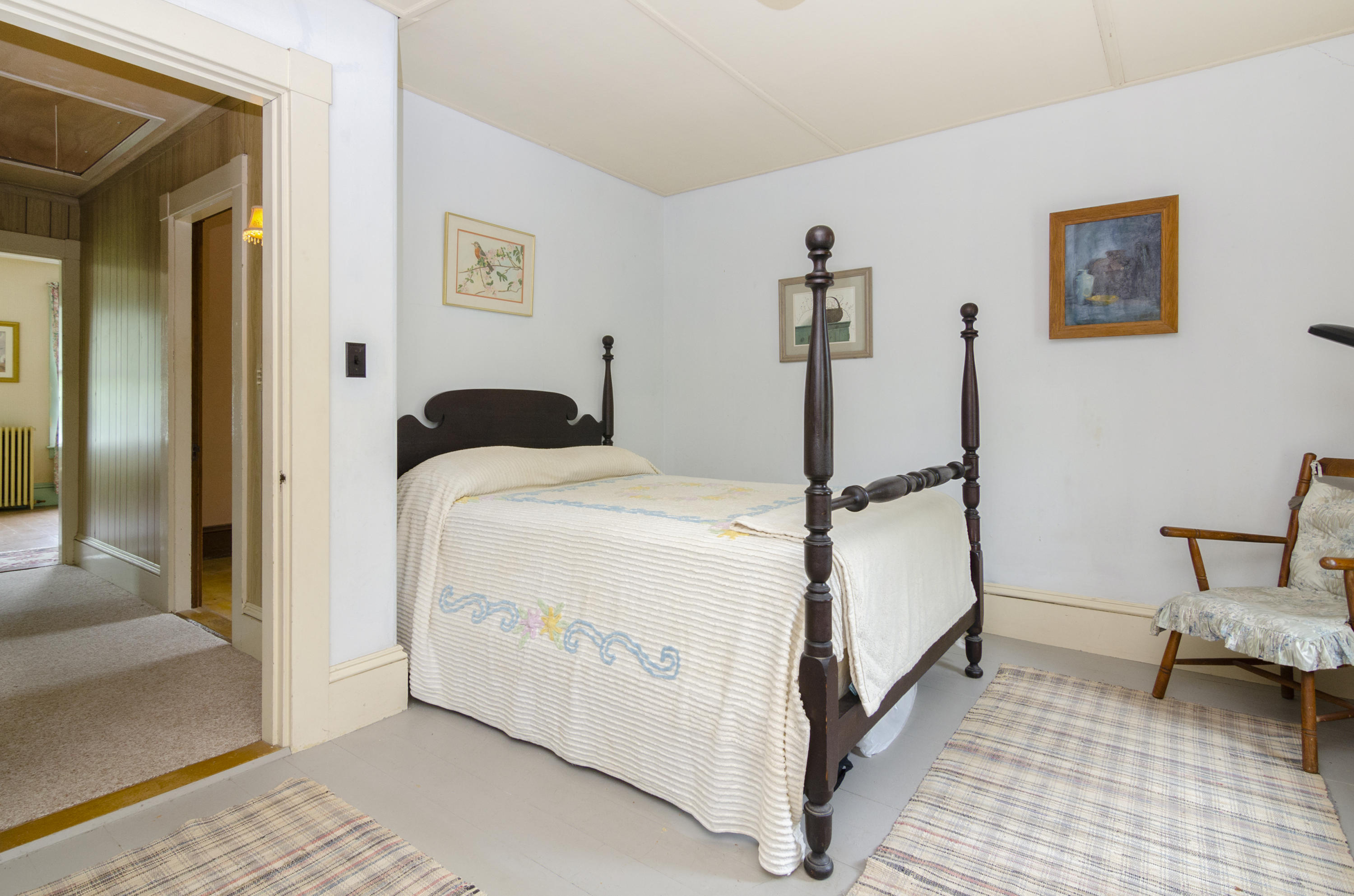 409 Barlows Landing Road Pocasset, MA 02559 - Photo 10 of 26 a spacious bedroom with a bed and a table