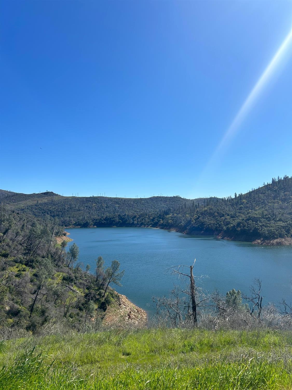 1234 Hog Ranch Road Oroville, CA 95965 - Photo 21 of 21 a view of a lake with mountain in the background