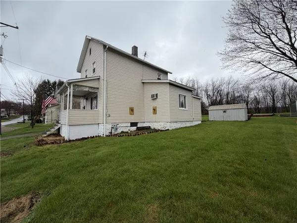 a view of a backyard with plants