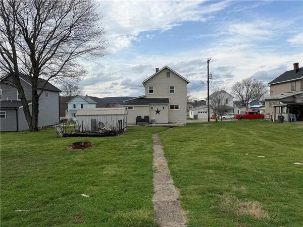 a kitchen with stainless steel appliances granite countertop a sink and a stove
