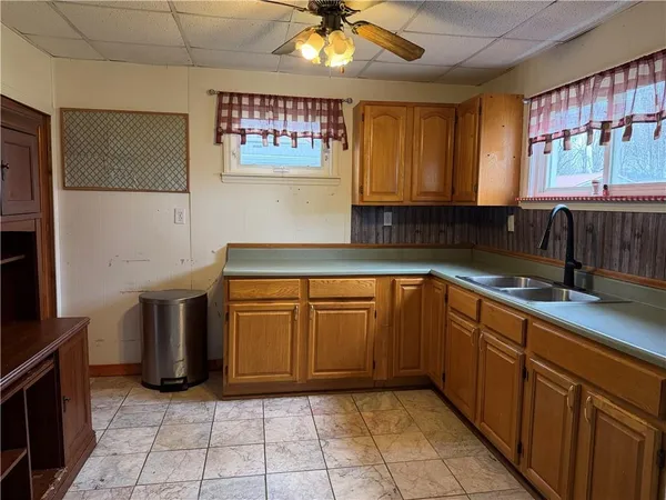 a view of a livingroom with furniture and wooden floor