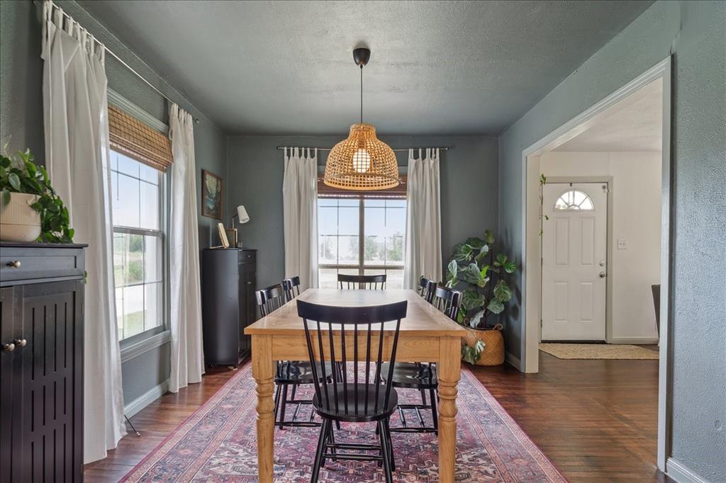 13347 Old China Spring Road China Spring, TX 76633 - Photo 11 of 38 a view of a dining room with furniture window and wooden floor