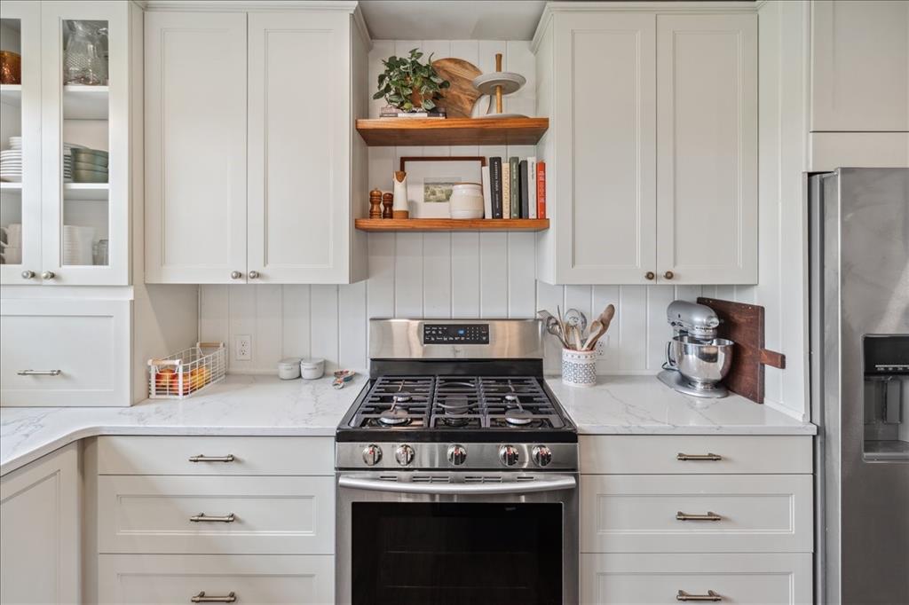 13347 Old China Spring Road China Spring, TX 76633 - Photo 16 of 38 a white stove top oven sitting inside of a kitchen