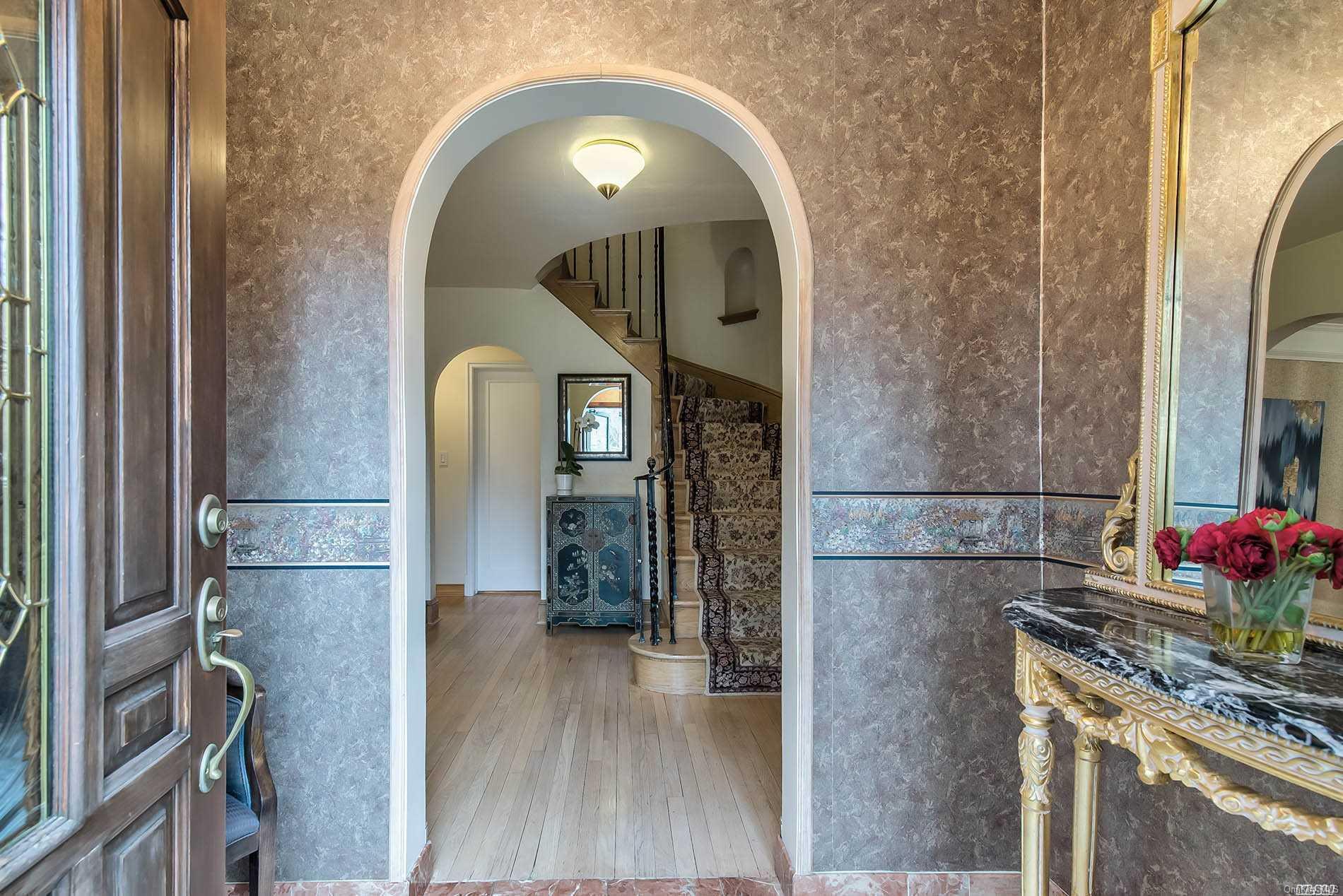 34 Knickerbocker Road Manhasset, NY 11030 - Photo 1 of 1 a view of entryway with wooden floor
