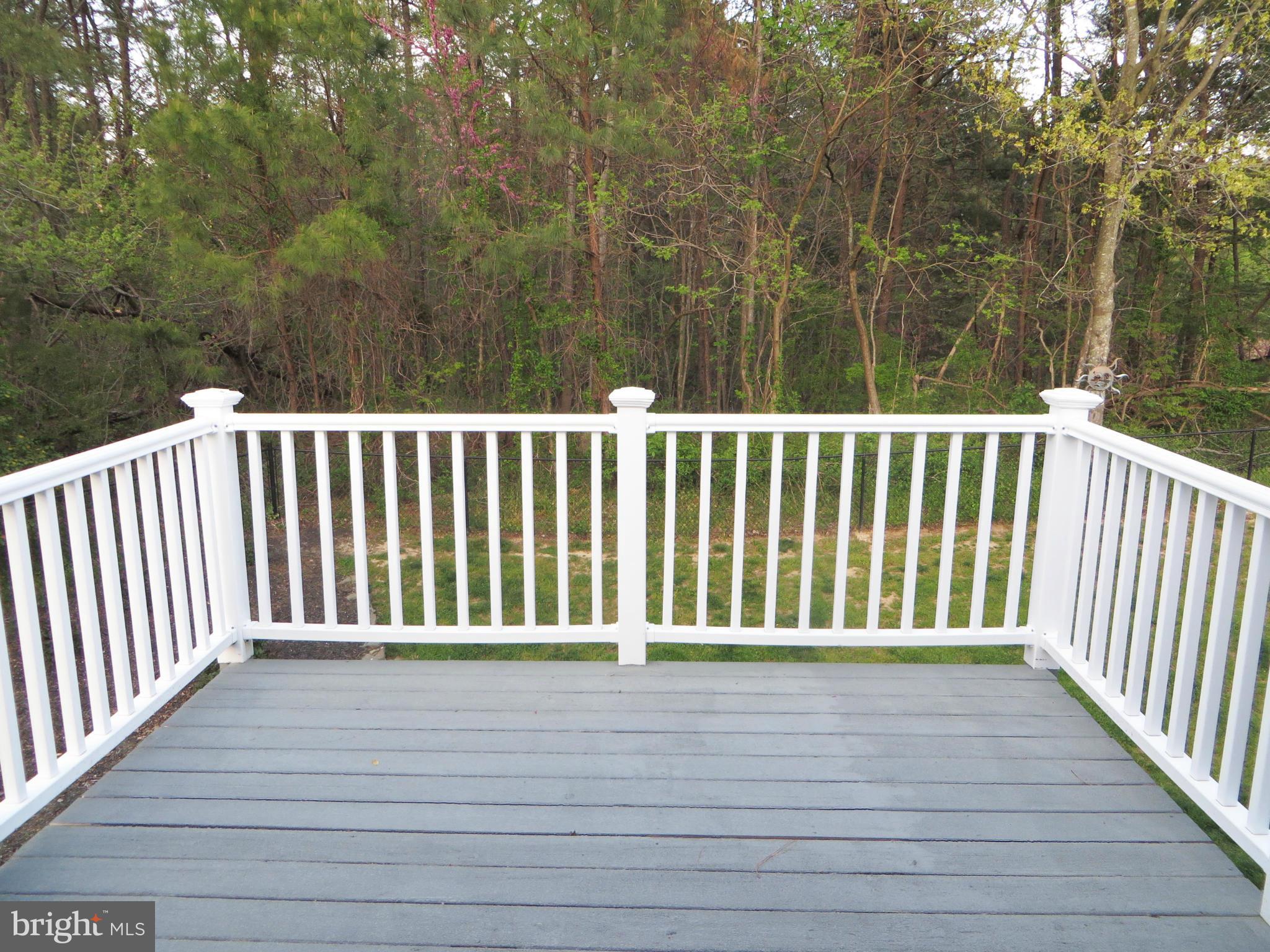 275 Hilltop Road Lusby, MD 20657 - Photo 20 of 30 Balcony deck off the fourth bedroom