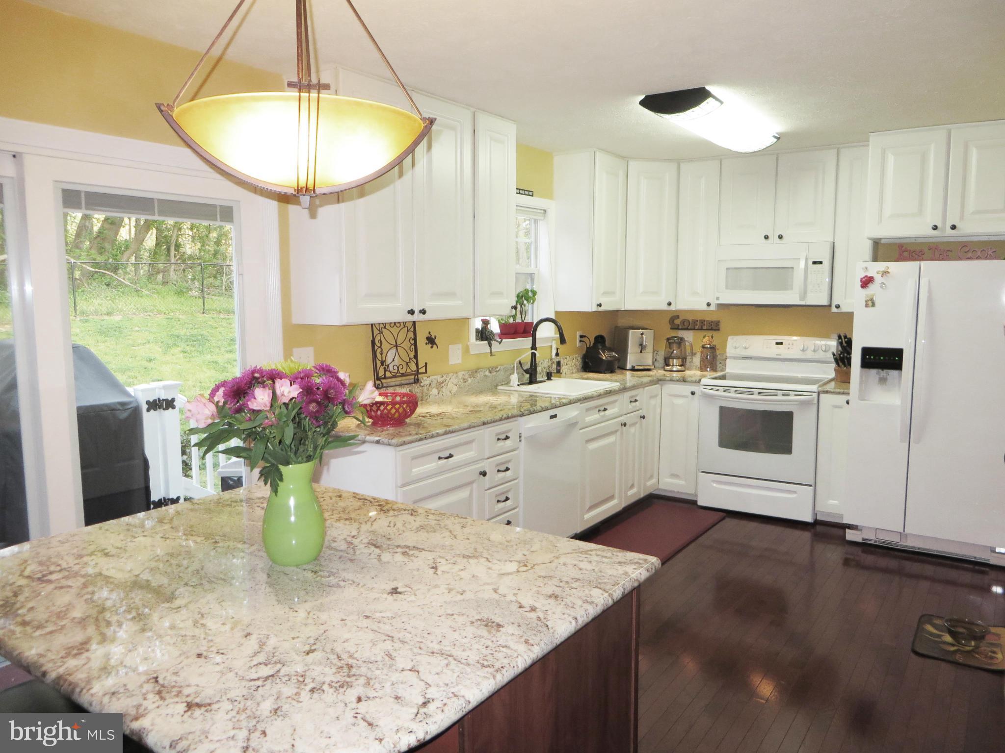 275 Hilltop Road Lusby, MD 20657 - Photo 7 of 30 Kitchen has hardwood, too